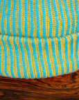 The Elder Statesman 100% Cashmere Watchman cap in Teal/Yellow