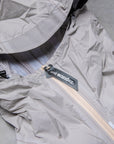 And Wander 3L UL Rain Jacket Light Gray