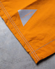 And Wander Light Hike Shorts Orange