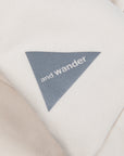 And Wander light fleece pants off white