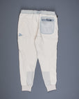 And Wander light fleece pants off white