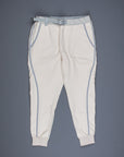 And Wander light fleece pants off white