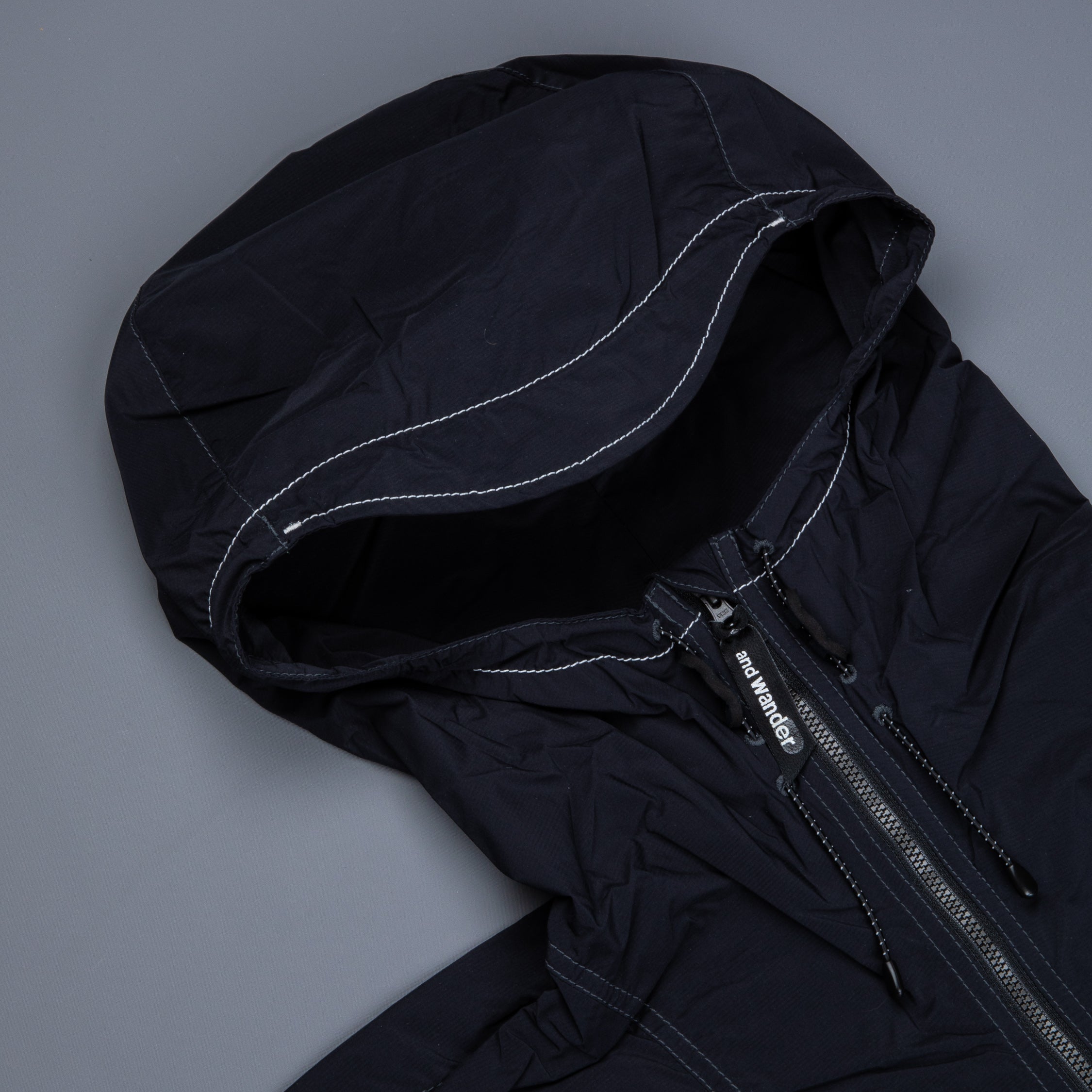 And Wander Pertex wind jacket black