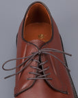 Alden plain toe blucher in brown grained leather on crepe sole