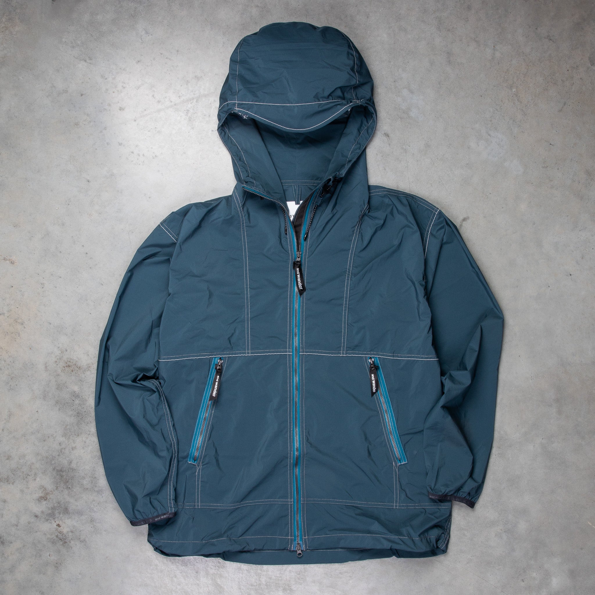 And Wander Pertex Wind Jacket Dark Blue