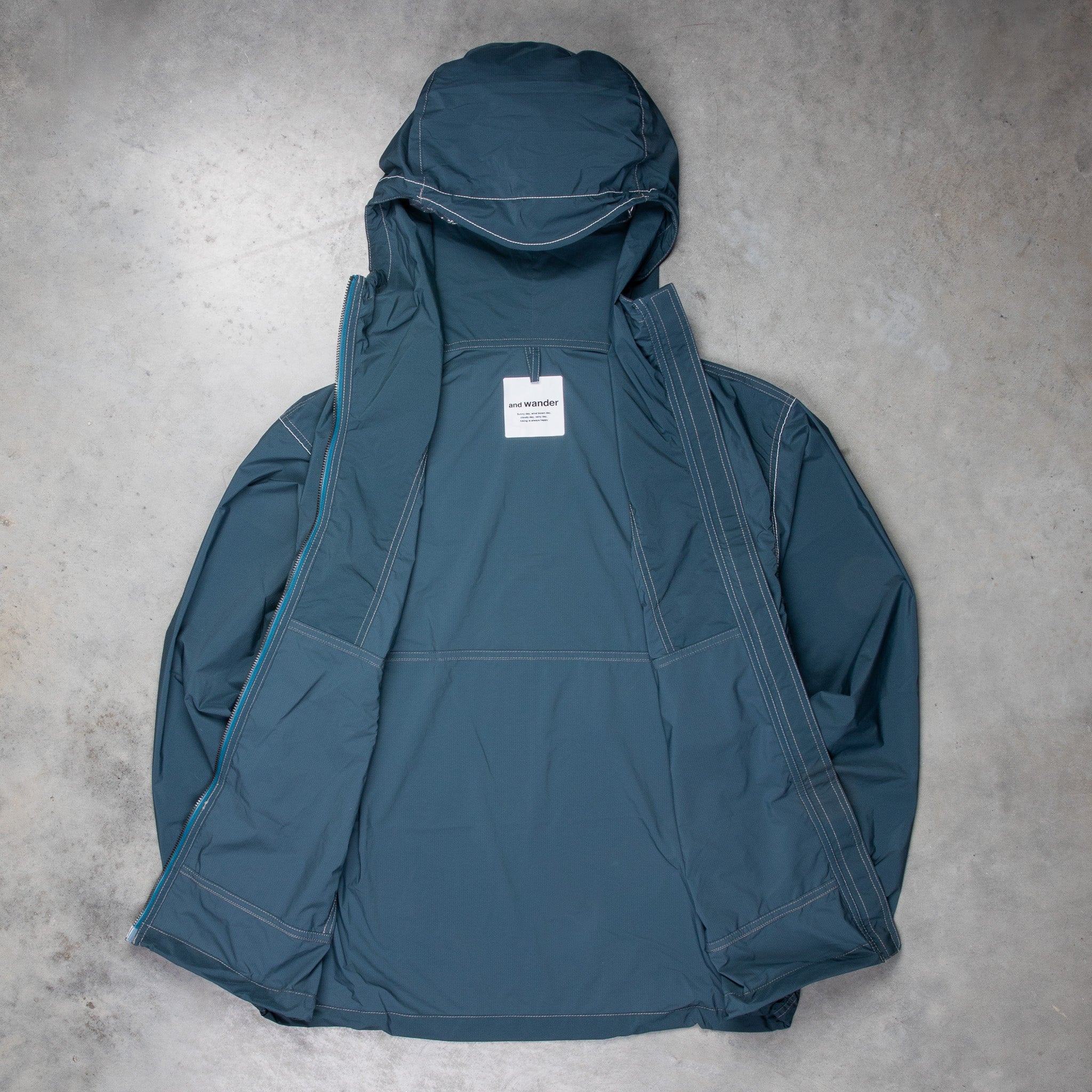 And Wander Pertex Wind Jacket Dark Blue