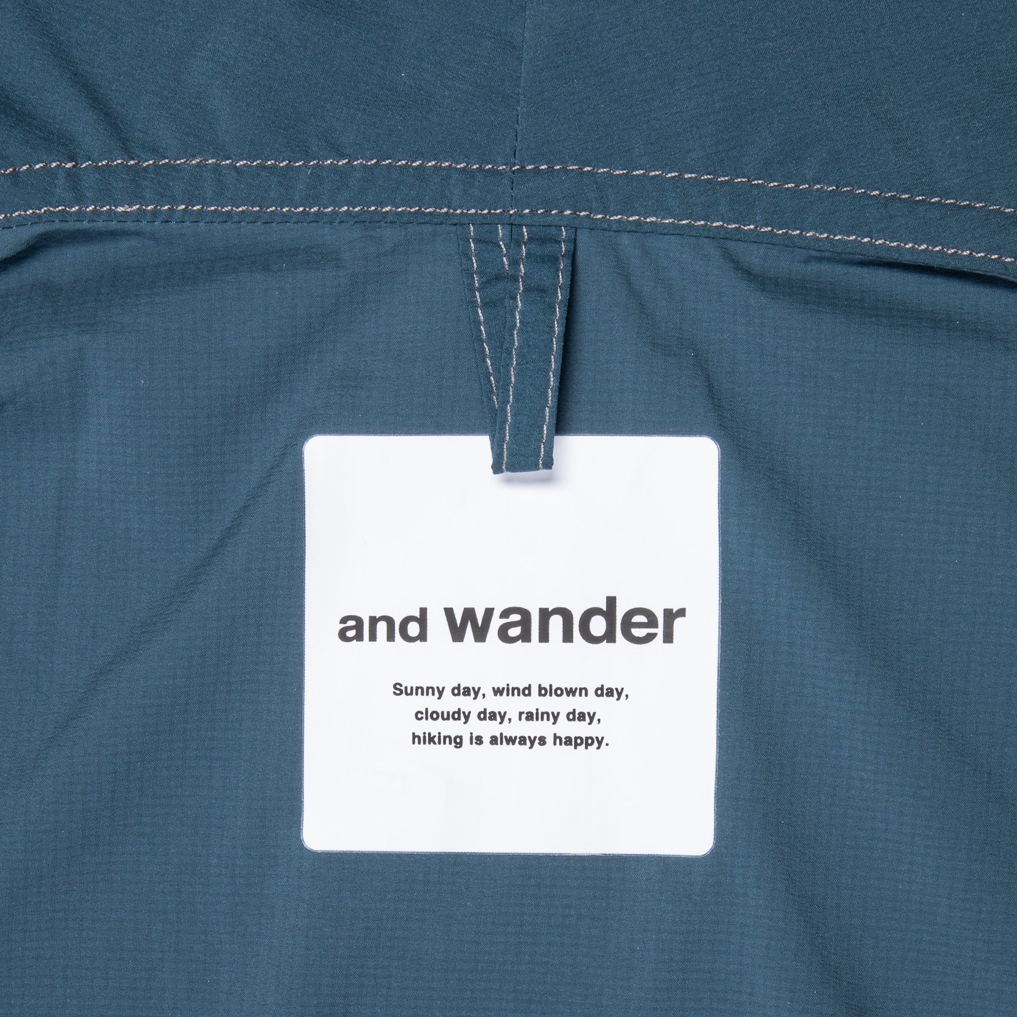 And Wander Pertex Wind Jacket Dark Blue