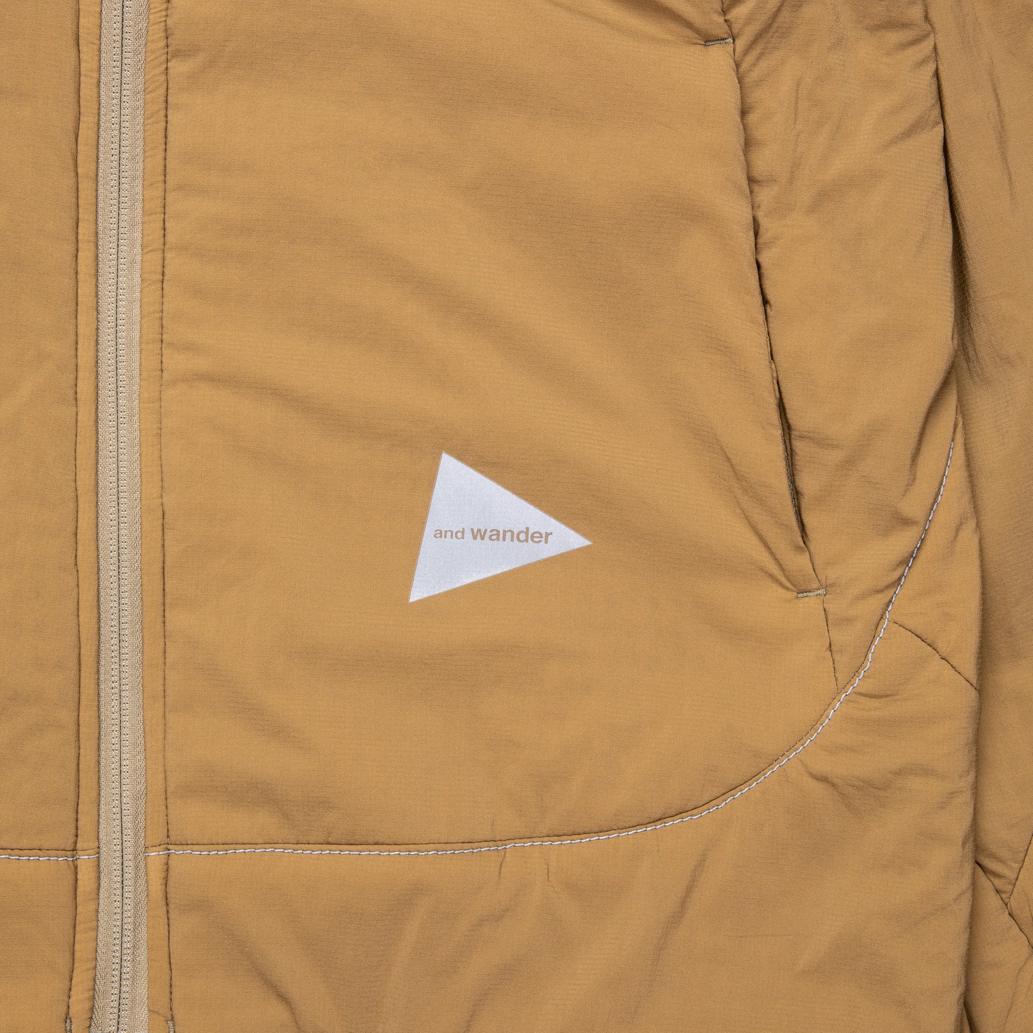 And Wander Alpha Air Jacket Beige