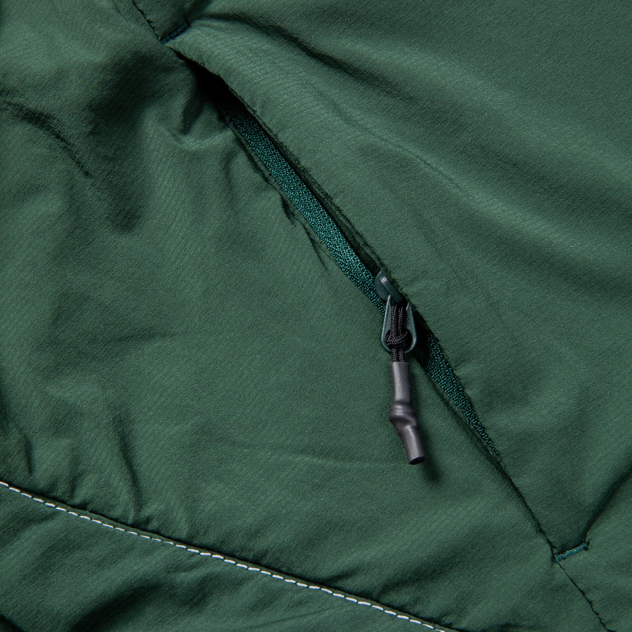 And Wander Alpha Air Jacket Green