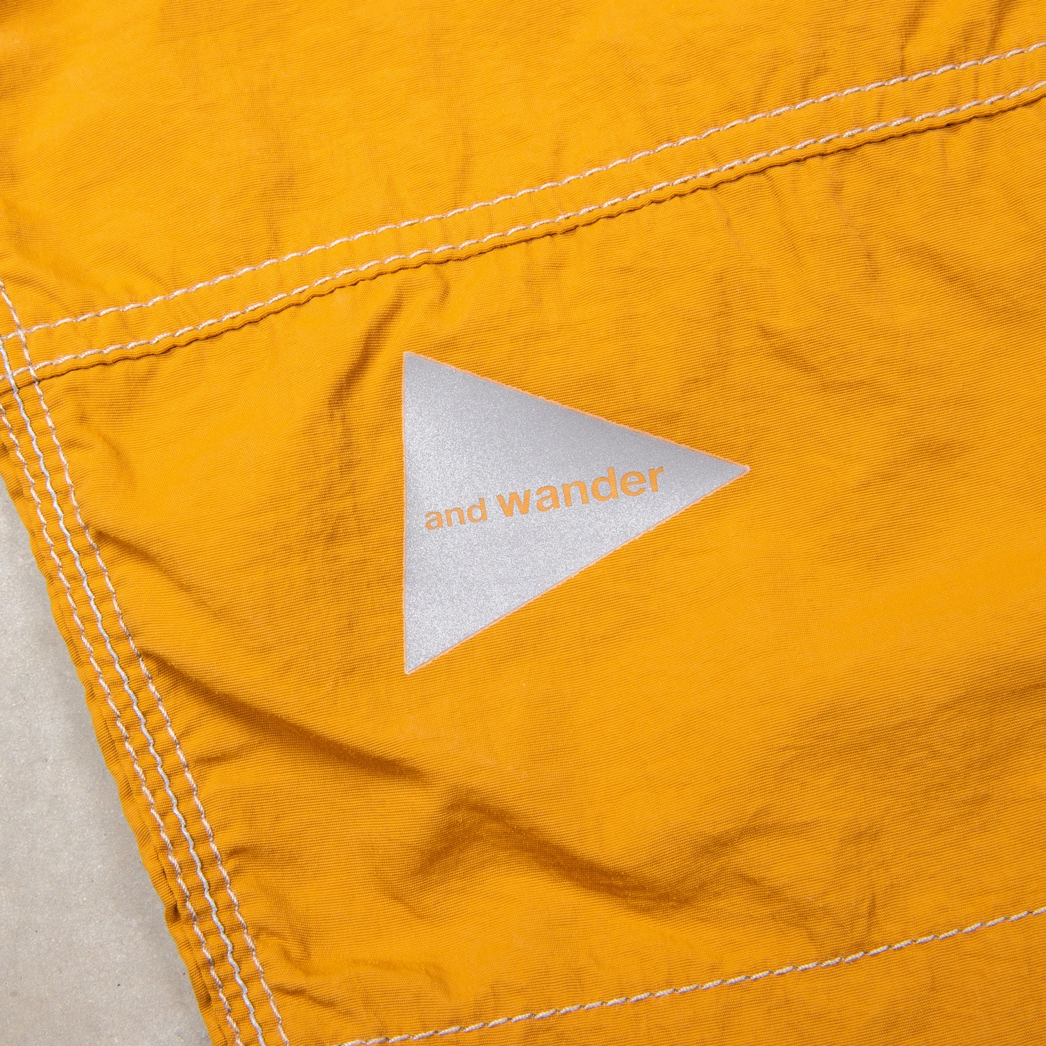 And Wander Ny Taffeta Hiker Shorts Yellow