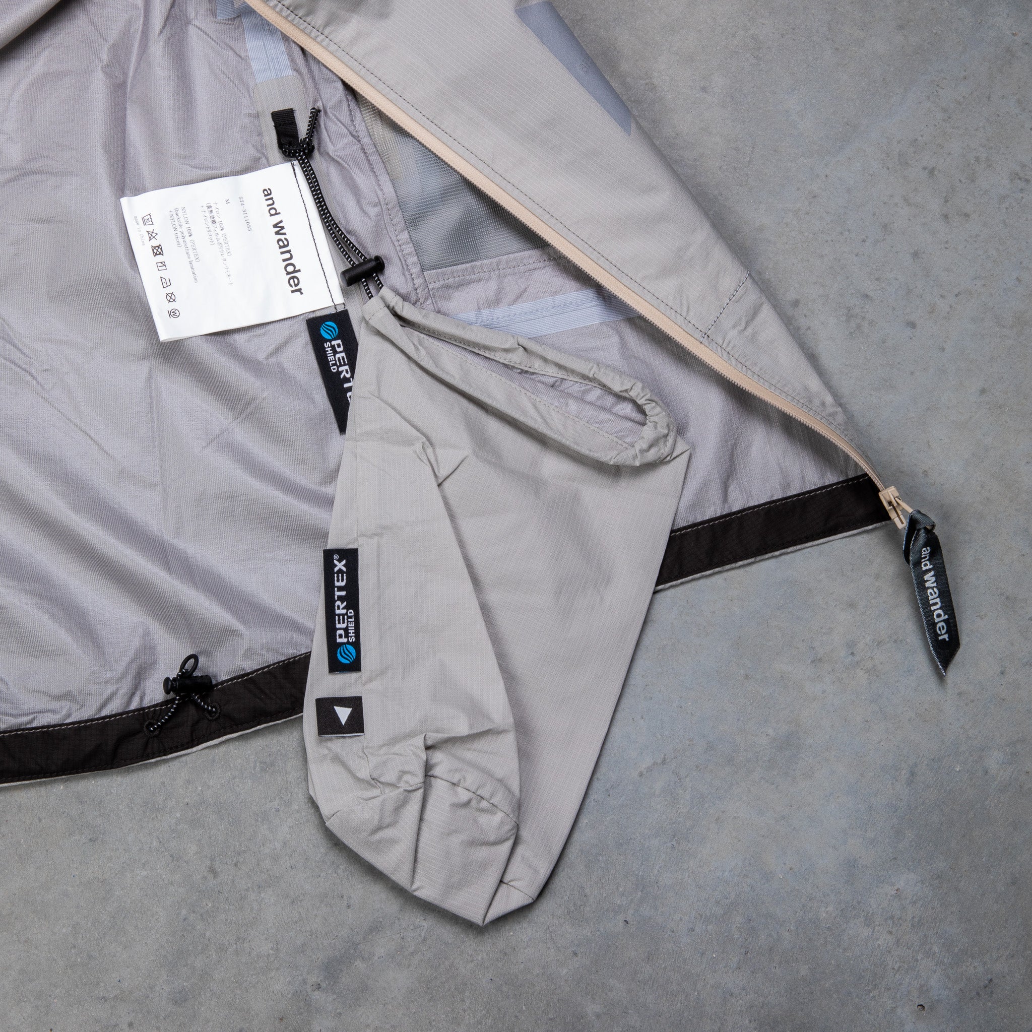 And Wander 3L UL Rain Jacket Light Gray