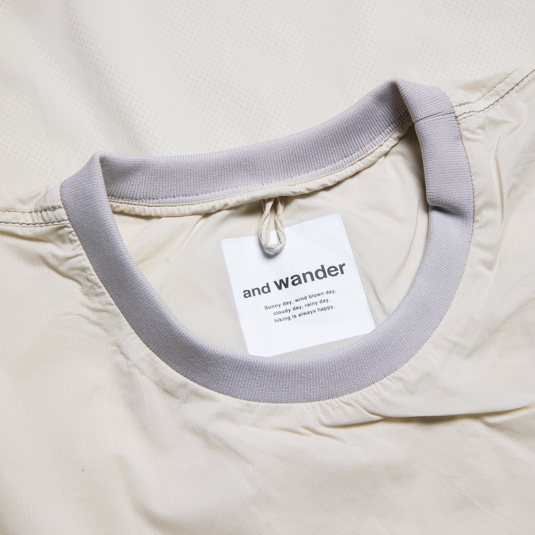 And Wander Pertex Wind T Off-White