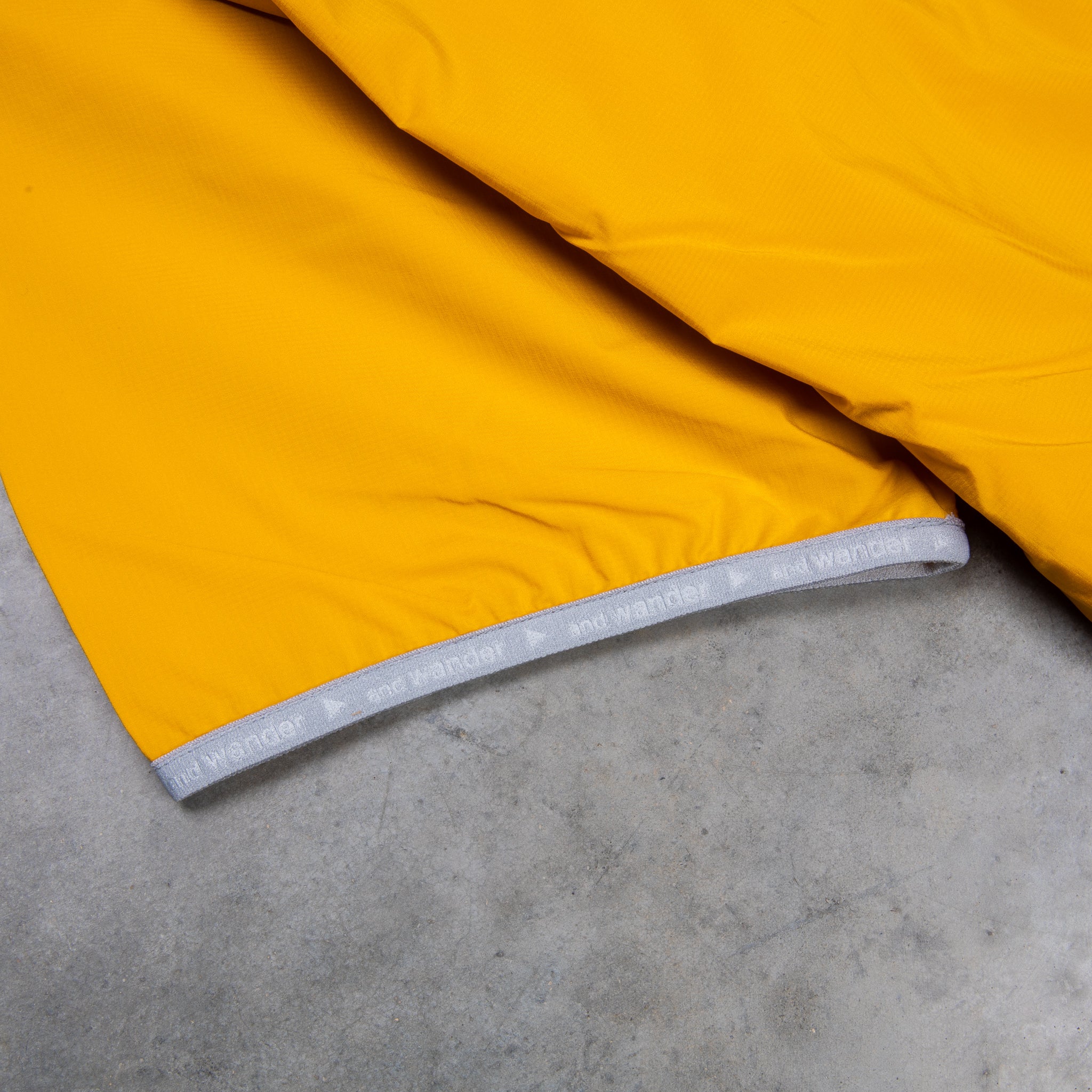 And Wander Pertex Wind T Yellow
