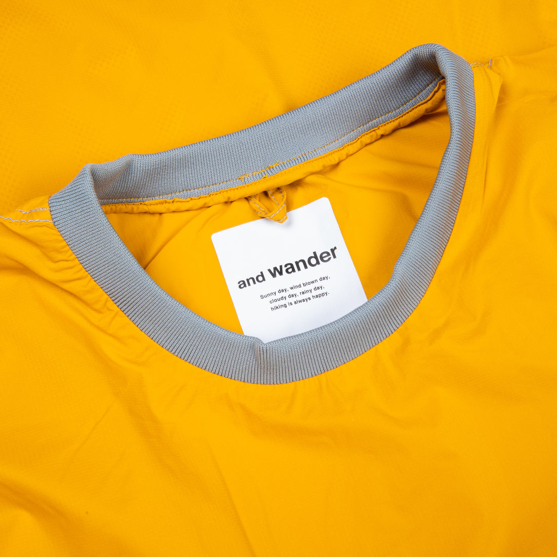 And Wander Pertex Wind T Yellow
