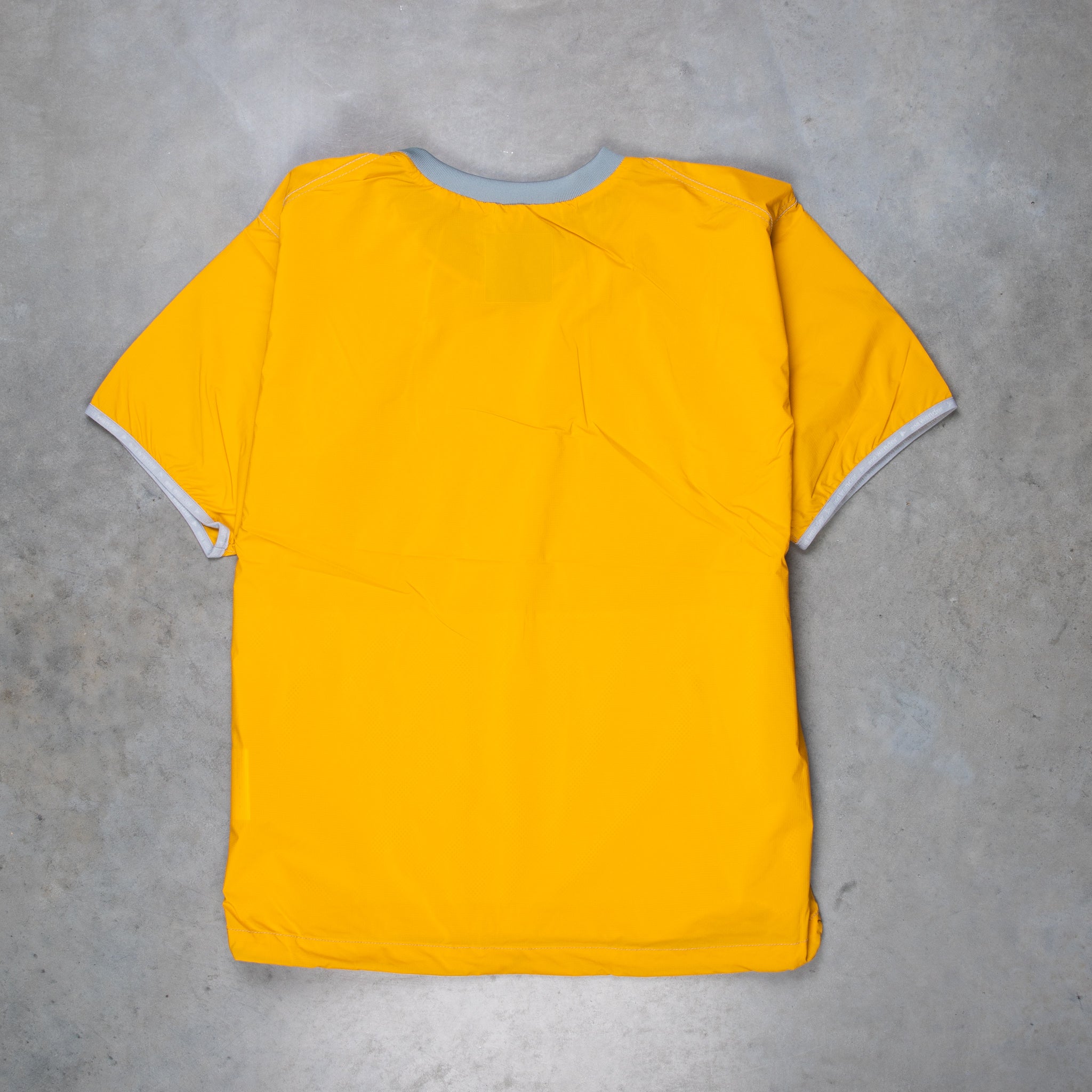 And Wander Pertex Wind T Yellow