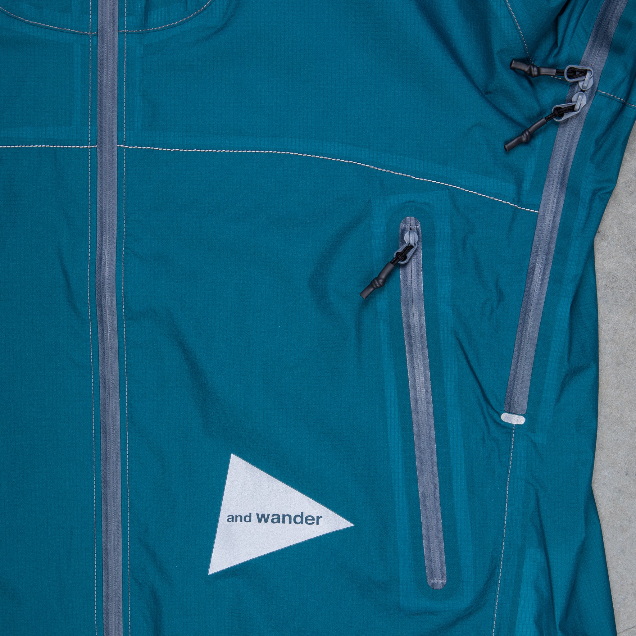 And Wander 3L UL Rain Jacket Blue