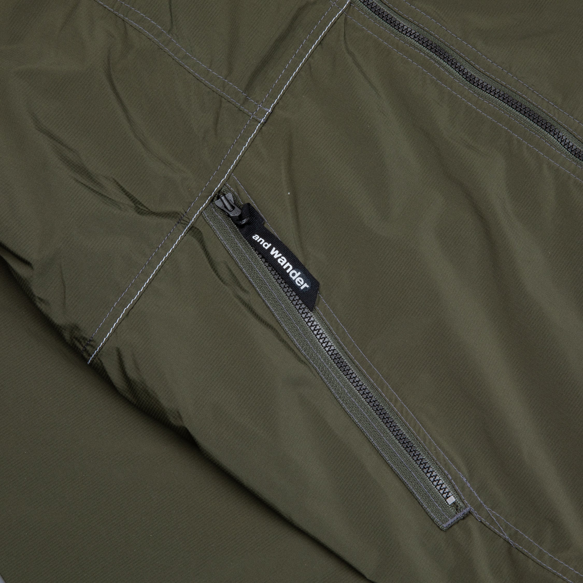 And Wander Pertex wind jacket khaki – Frans Boone Store