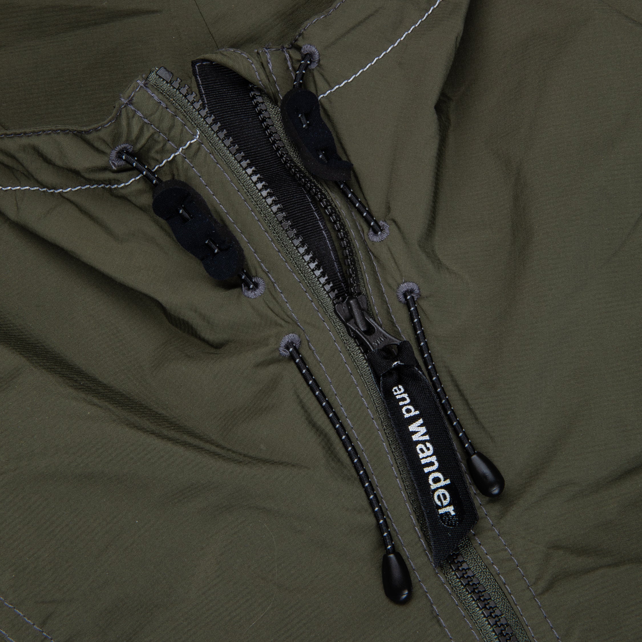 And Wander Pertex wind jacket khaki
