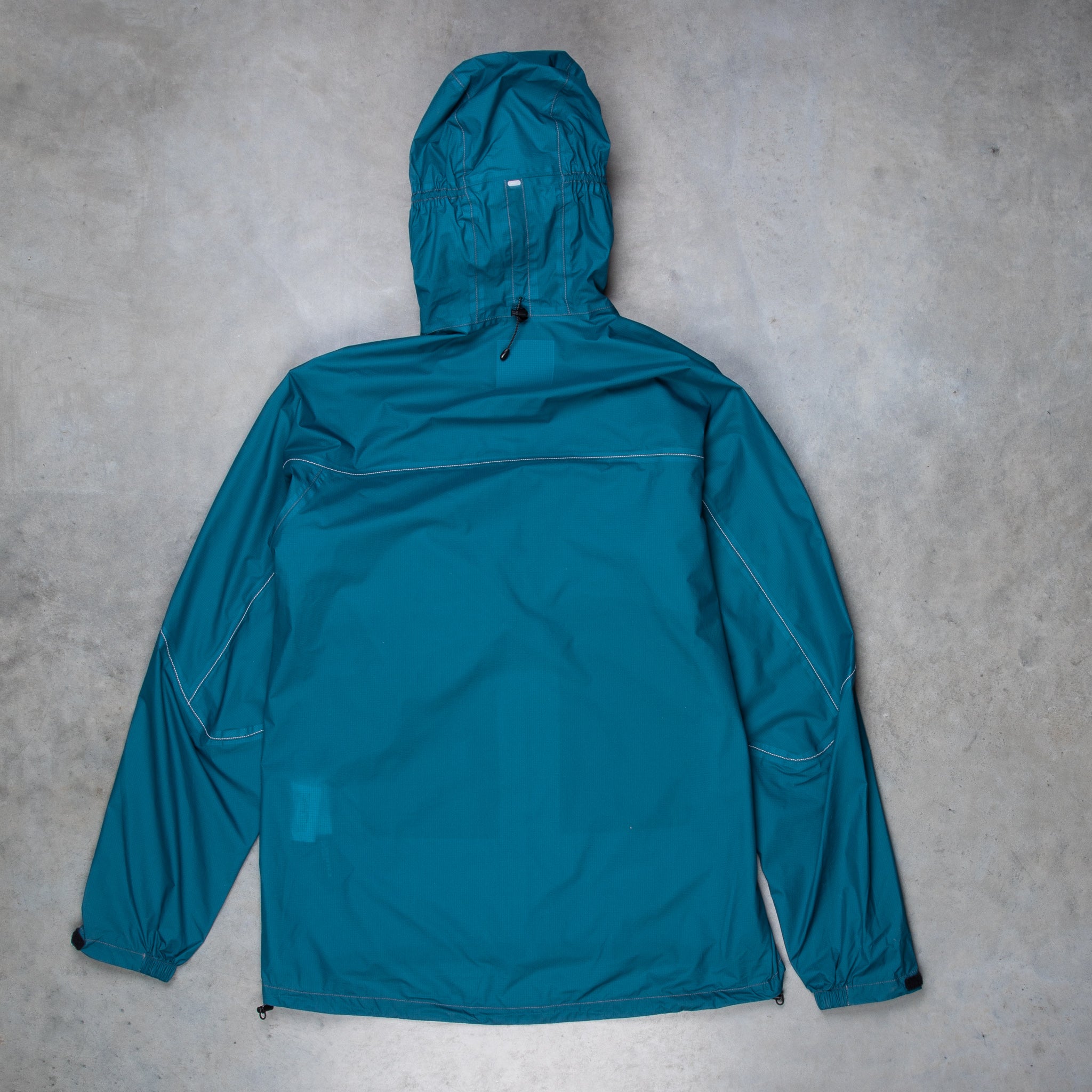And Wander 3L UL Rain Jacket Blue