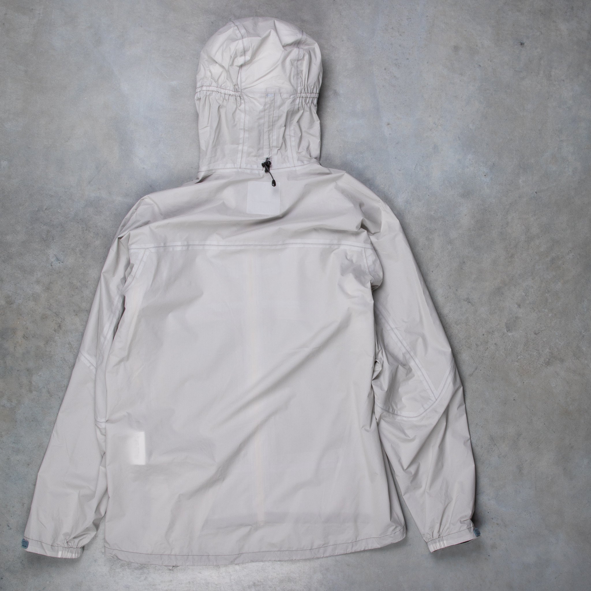 And Wander 3L UL Rain Jacket Light Gray