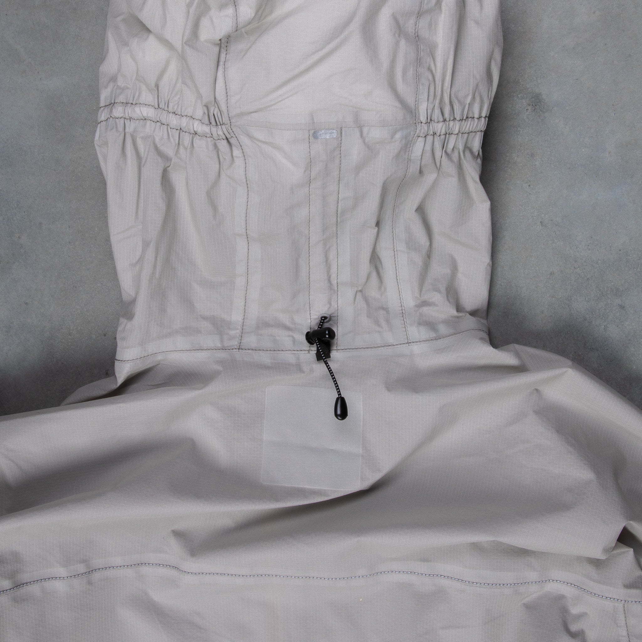 And Wander 3L UL Rain Jacket Light Gray