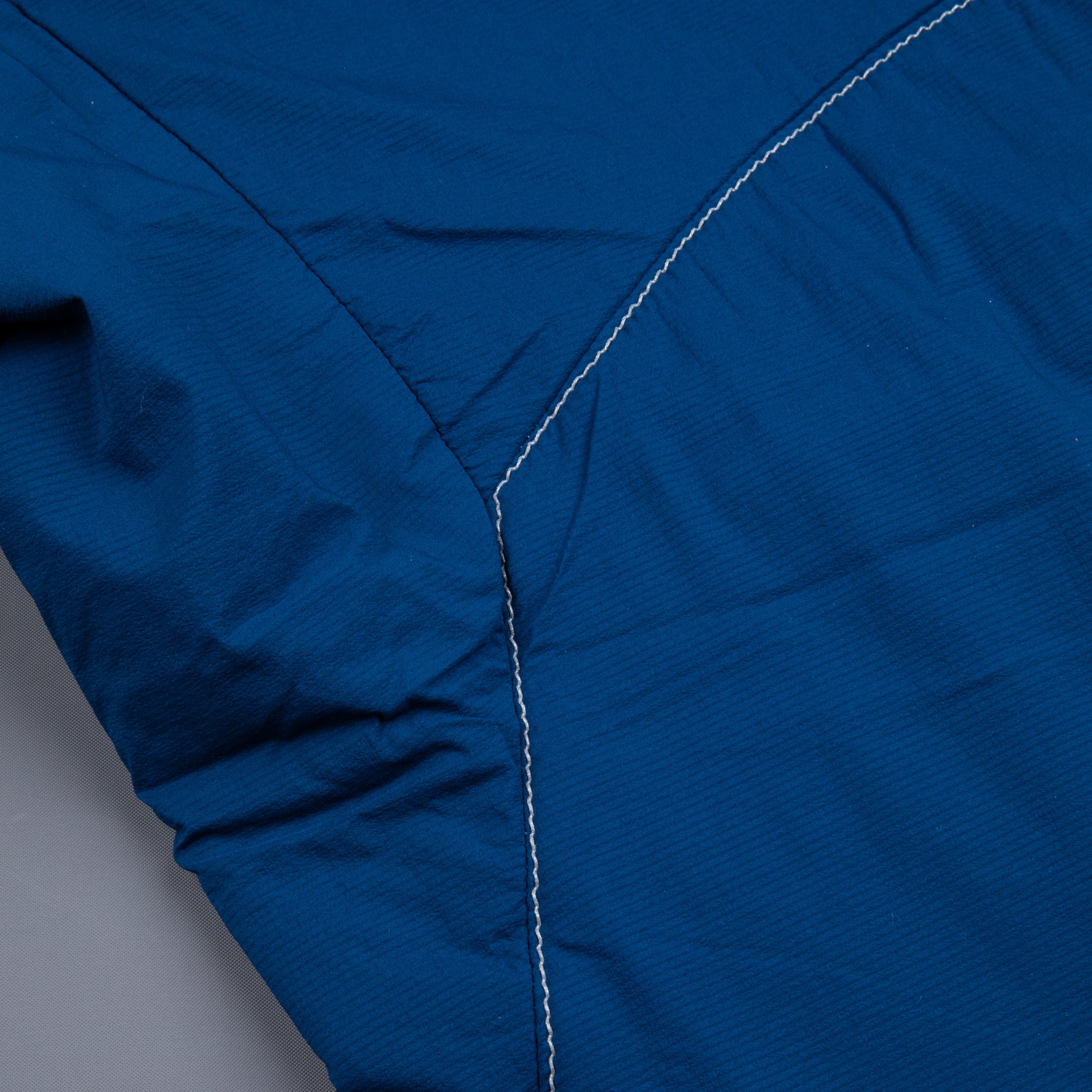 And Wander Alpha Air Hoodie Blue