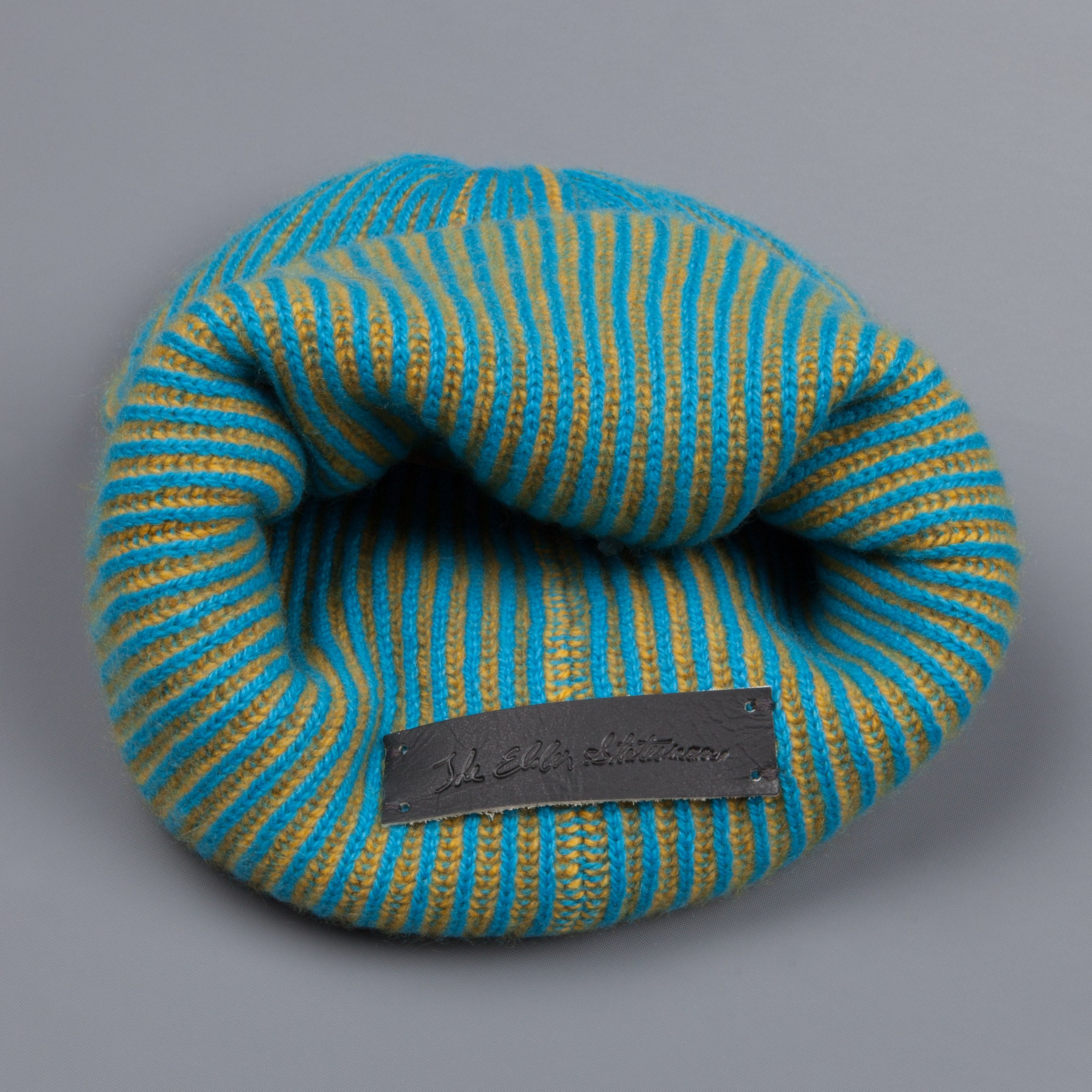 The Elder Statesman 100% Cashmere Watchman cap in Teal/Yellow