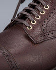 Alden Straight perforated cap toe boot in brown country calf grained leather