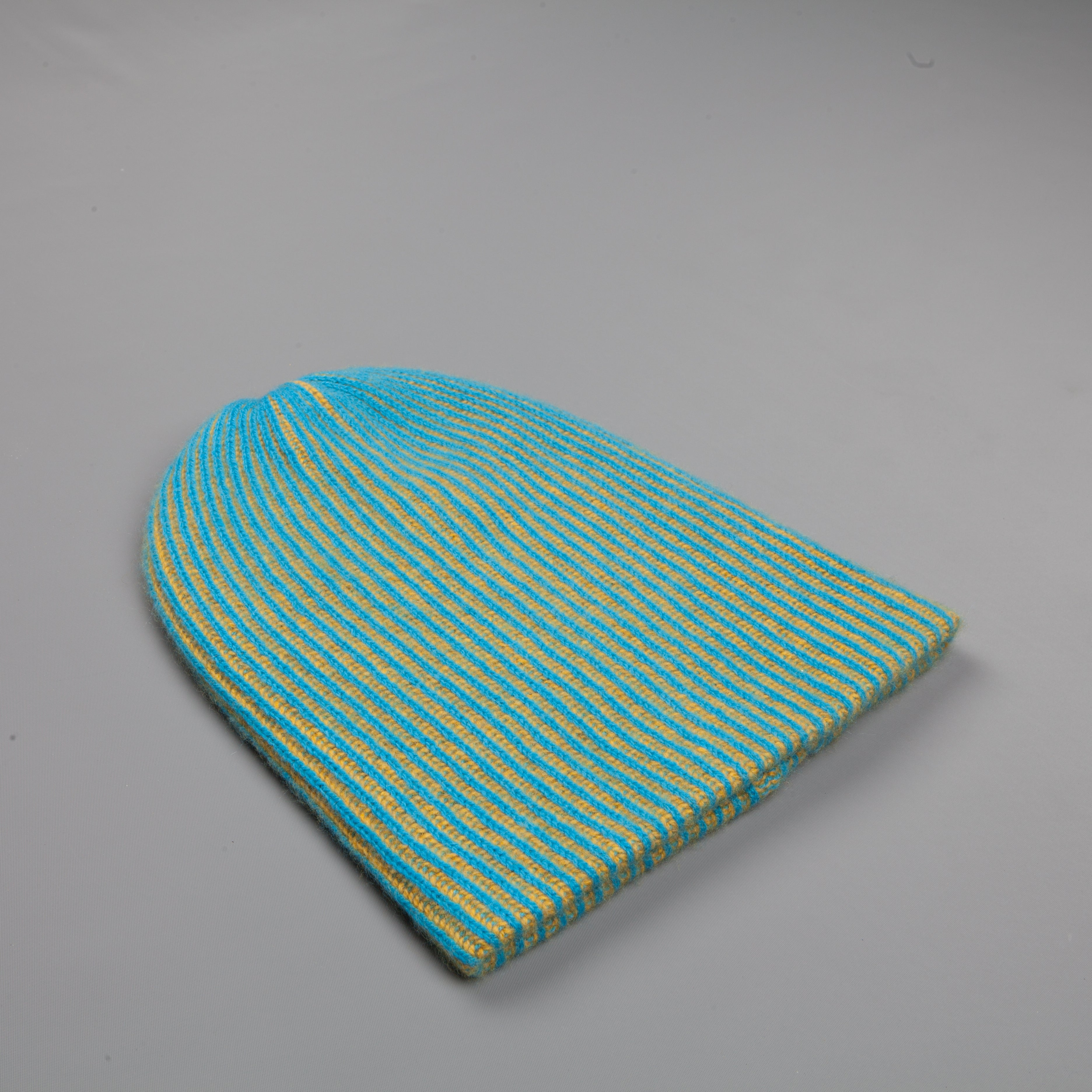 The Elder Statesman 100% Cashmere Watchman cap in Teal/Yellow